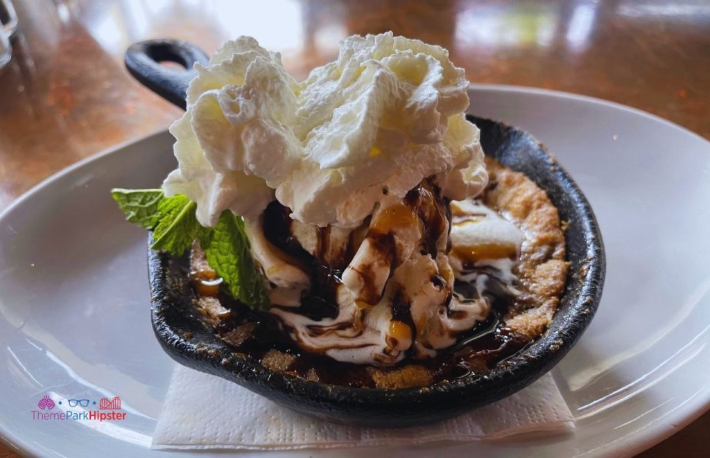 City Works Deep Dish Chocolate Chip Cookie Topped with Vanilla Ice Cream and Whipped Cream. One of the best places to get breakfast and Brunch in Disney Springs.