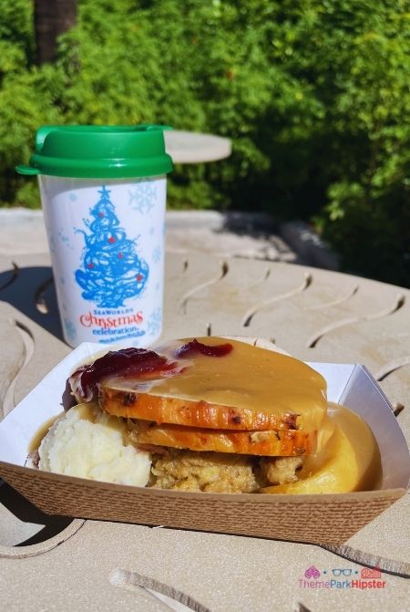 SeaWorld Christmas Celebration Traditional Holiday Meal with Turkey Gravy Mashed Potato Dressing and Cranberry Sauce. Keep reading to learn about Christmas at SeaWorld Orlando!
