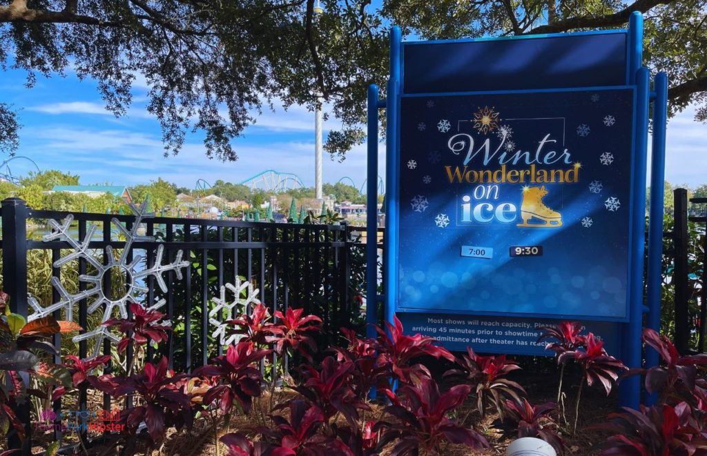Winter Wonderland on Ice sign surrounded by colorful plants and snowflake decorations. Keep reading for the full guide to SeaWorld Orlando special events. 