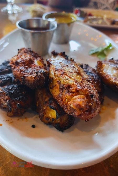 Smoked chicken wings at City Works in Disney Springs. Keep reading to learn how to do Thanksgiving Day dinner at Disney World.