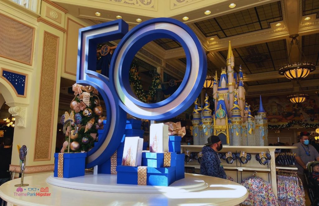 Walt Disney World 50th Anniversary Celebration Merchandise store Magic Kingdom. Keep reading to get the best Disney World souvenirs to buy for your trip!