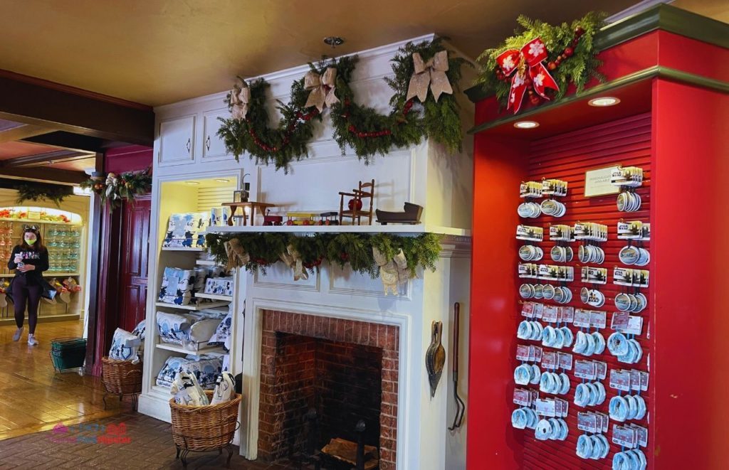 Ye Olde Christmas Shop in the Magic Kingdom Fireplace. Keep reading to learn about the best things to do at Disney World for Christmas.