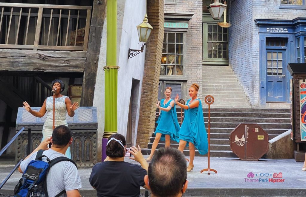 Celestina Warbeck and Banshees Singing on Stage in Diagon Alley