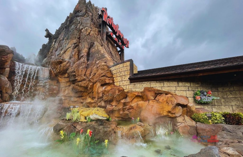 Disney Springs Rainforest Cafe Misty Lagoon in front of Volcano. Keep reading to get get the best solo travel safety tips for your Disney World trip alone.