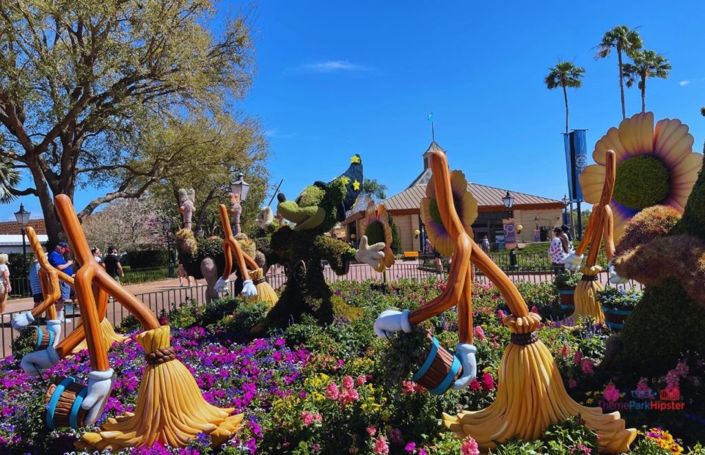 Epcot Flower and Garden Festival Mickey Mouse Fantasia Topiary. Keep reading to see the best epcot flower and garden topiaries through the years!