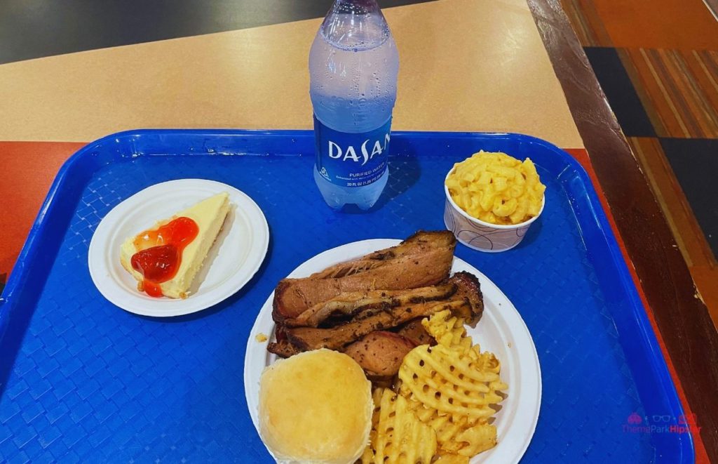 SeaWorld Orlando All-Day Dining Plan Brisket and Fries with mac n cheese with cheesecake.