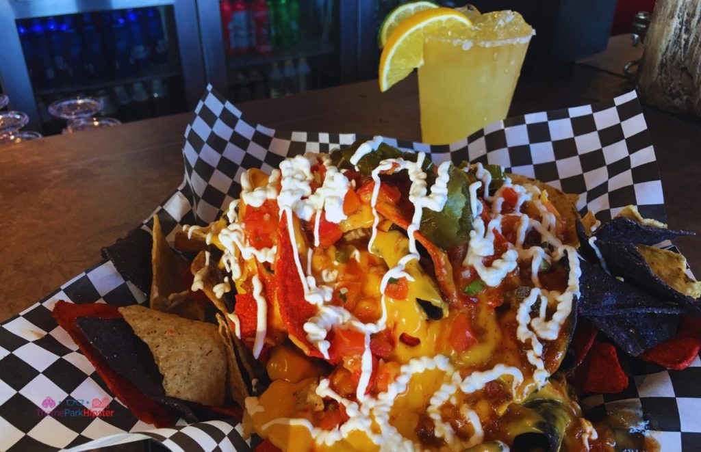 SeaWorld Orlando Loaded Nachos and Margarita at Flamecraft Bar. Keep reading to find out all you need to know about SeaWorld Orlando special events. 