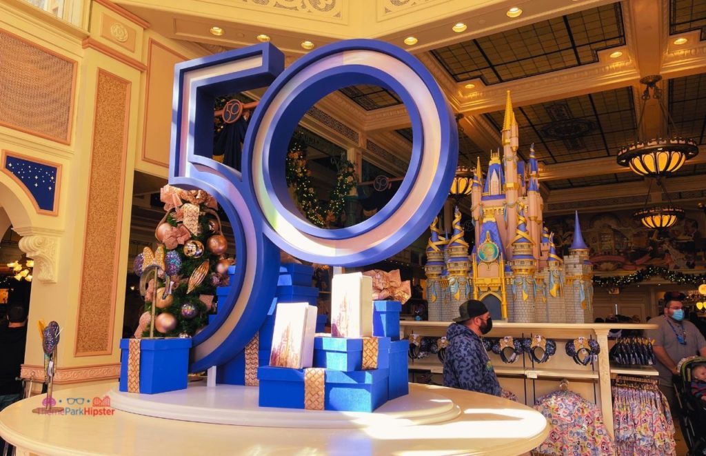Disney Magic Kingdom 50th Anniversary sign in the store. Keep reading to find the best gifts from Disney World.
