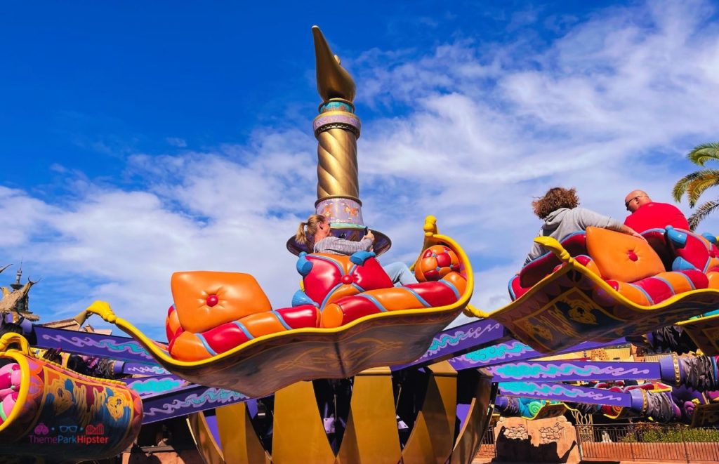 Disney Magic Kingdom Aladdin Magic Carpet Ride in Adventureland. Keep reading to get the best movies to watch for Disney World Magic Kingdom.