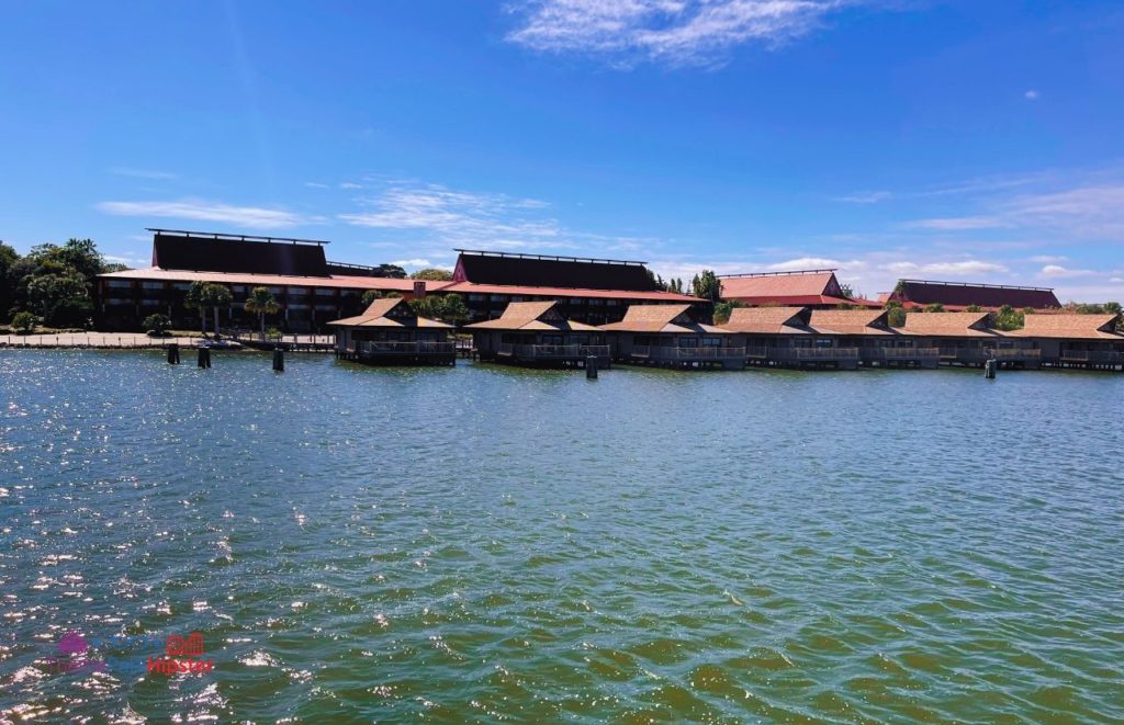 Disney Magic Kingdom Polynesian Resort Bungalows overlooking lagoon. Keep reading to get get the best solo travel safety tips for your Disney World trip alone.