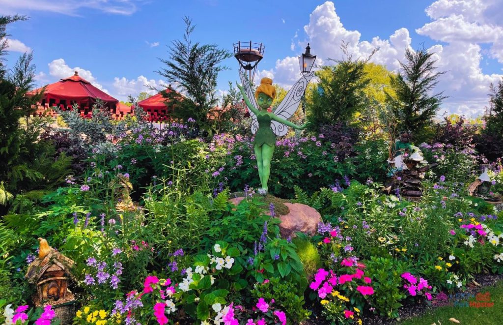 Epcot Flower and Garden Festival Tinker Bell Garden in UK Pavilion. Keep reading to see the best epcot flower and garden topiaries through the years!