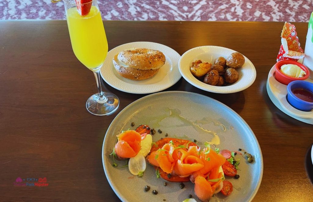 Topolino’s Terrace at Disney’s Riviera Resort Smoked Salmon with tomatoes mimosa bagel and potatoes