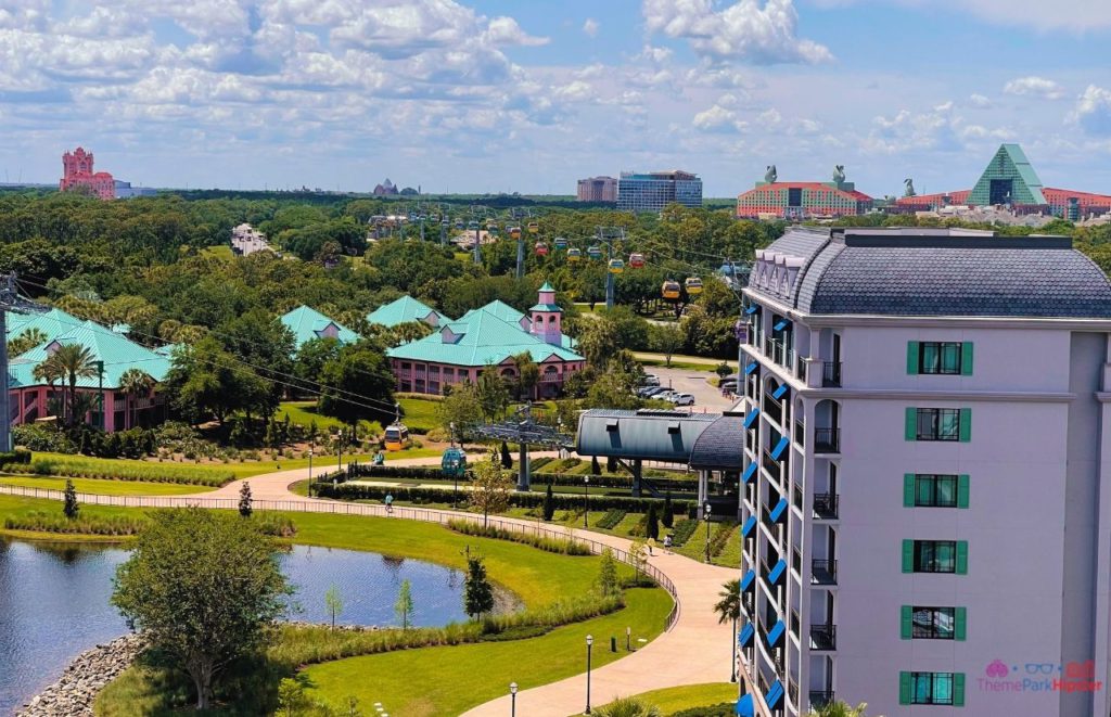 Topolino’s Terrace at Disney’s Riviera Resort view from rooftop of swan and dolphin tower of terror and skyliner. Keep reading to get the full Disney World Skyliner Guide with the Cost, Hours, Tips and more!