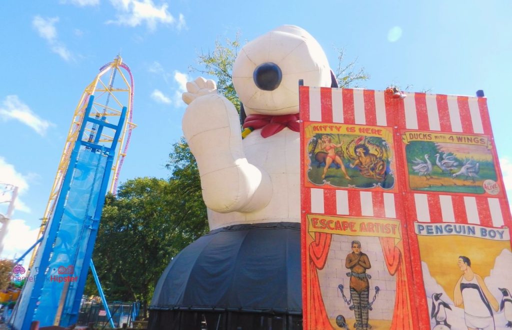 Cedar Point Snoopy Inflatable next to Top Thrill Dragster. Keep reading to get the full guide on the Cedar Point Season Pass Benefits and Cost.