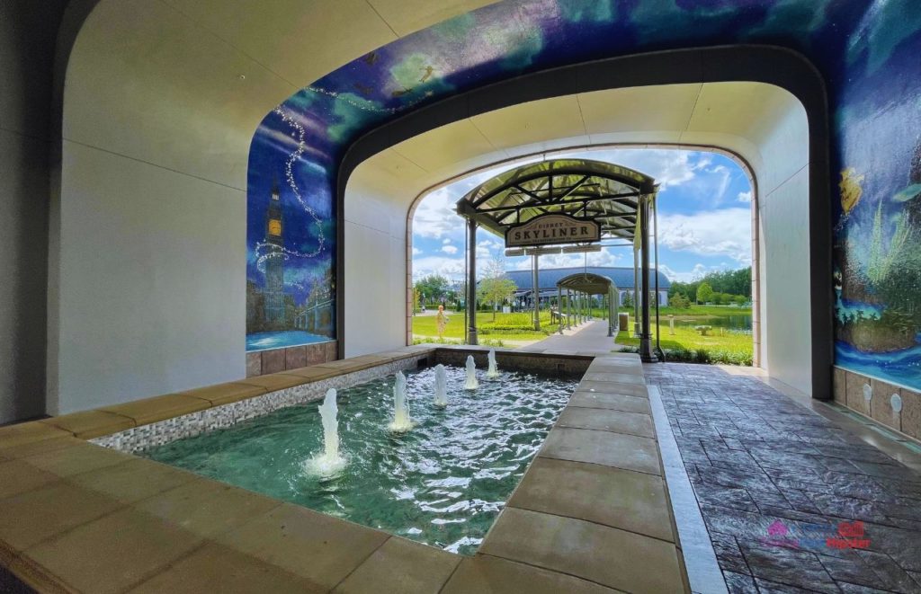 Disney Riviera Resort fountain to skyliner with Peter Pan mosaic