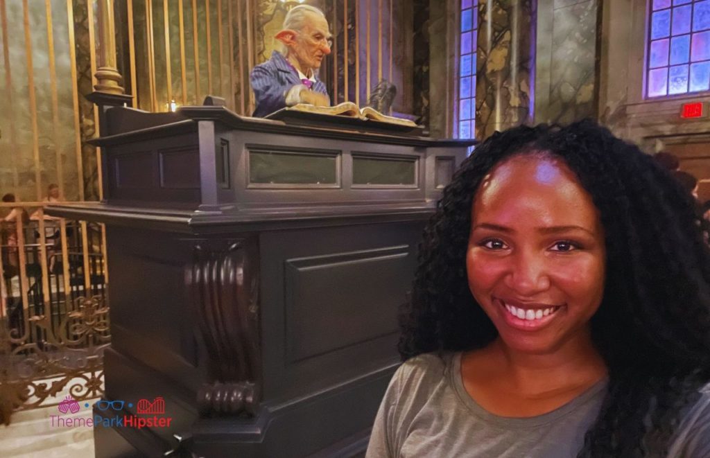 Universal Orlando Resort NikkyJ in front of Globin in Gringotts Bank in Diagon Alley at Universal Studios Florida Harry Potter World. Keep reading to get the best Universal Studios Orlando tips for beginners and first timers.
