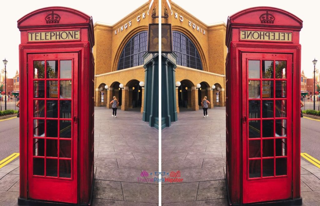 Universal Orlando Resort Red Telephone Booth in front of Kings Cross Station at Harry Potter World Diagon Alley Getting Ready to call the Ministry of Magic of Epic Universe.