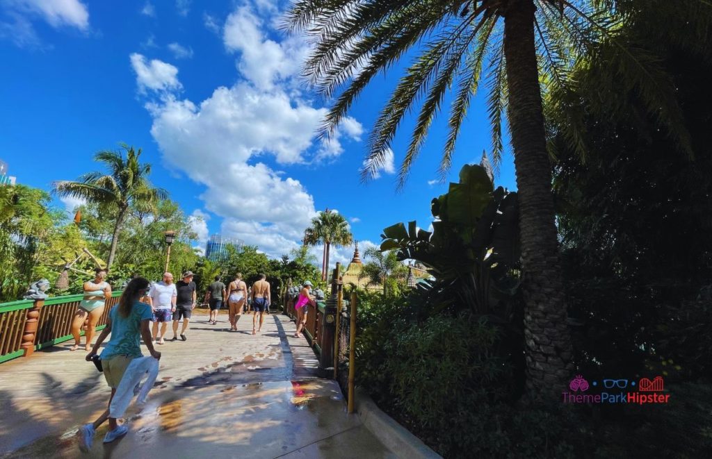 Universal Orlando Resort Volcano Bay people walking on the pathway.