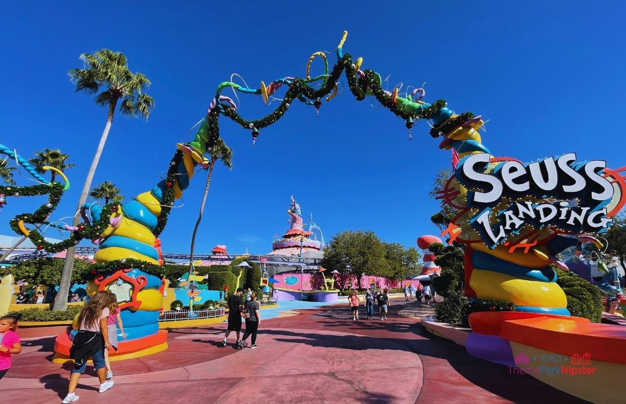 Universal Orlando Resort entrance to Christmas at Seuss Landing in Islands of Adventure. Keep reading to learn how to plan a day at Universal with this Islands of Adventure 1 day itinerary!