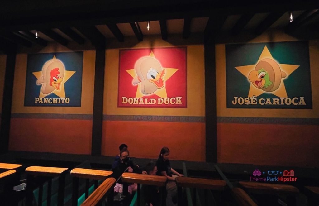 Boarding ride in Mexico Pavilion Gran Fiesta Tour Starring the Three Caballeros. Keep reading to get the world rides at Epcot for solo travelers on a solo disney world trip.
