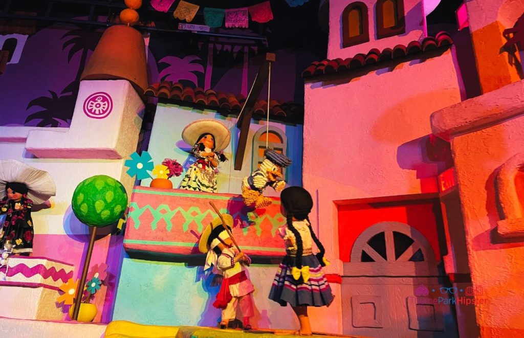 Boarding ride in Mexico Pavilion Gran Fiesta Tour Starring the Three Caballeros Animatronics. Keep reading to get the world rides at Epcot for solo travelers on a solo disney world trip.