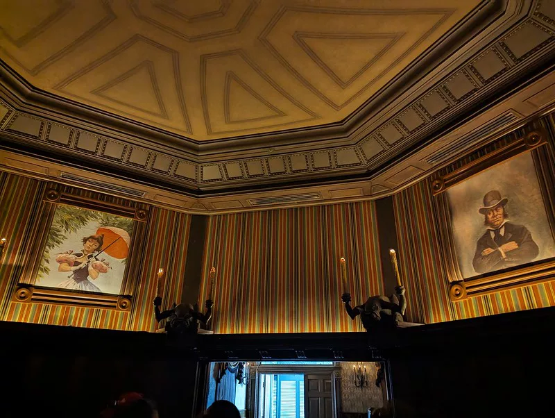 Haunted Mansion Stretching Room Portraits with Gargoyles