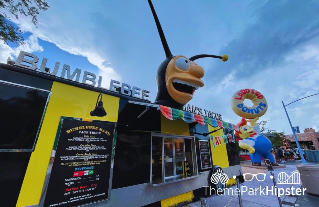 Universal Orlando Resort Bumblebee Man's Tacos in Springfield Simpsons Land with Lard Lad Donuts in background at Universal Studios Florida. Keep reading to get the best Universal Studios photos.