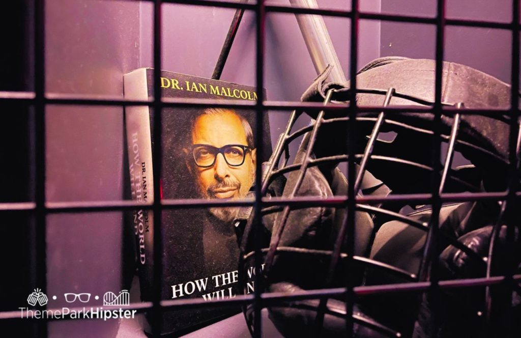 VelociCoaster queue Easter Egg and secret Dr Ian Malcolm Book Universal Orlando Resort Islands of Adventure. Keep reading to get the best Jurassic World Velocicoaster photos.