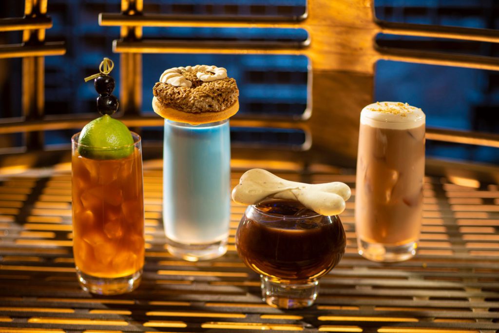 From Left to Right Moogan Tea, Blue Bantha, Bloody Rancor (contains alcohol) and the Black Spire Brew can be found at Oga’s Cantina at Star Wars Land in Disneyland and Hollywood Studios. Keep reading to find out what best drinks at Oga's Cantina are in Disney World Hollywood Studios and Disneyland.