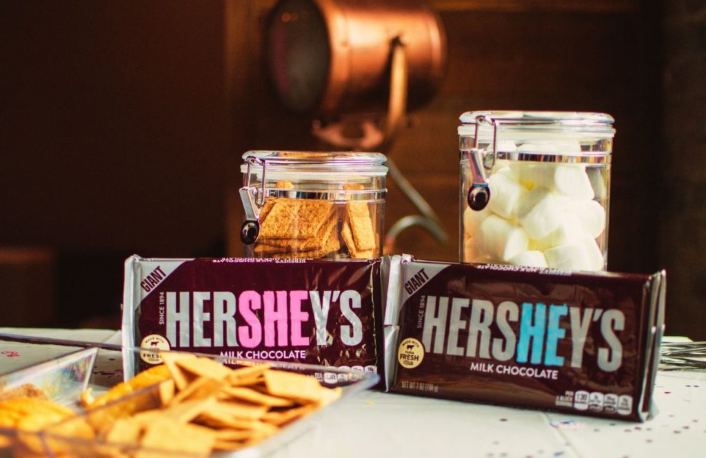 Hershey’s Milk Chocolate Bar next to marshmallows and graham crackers
