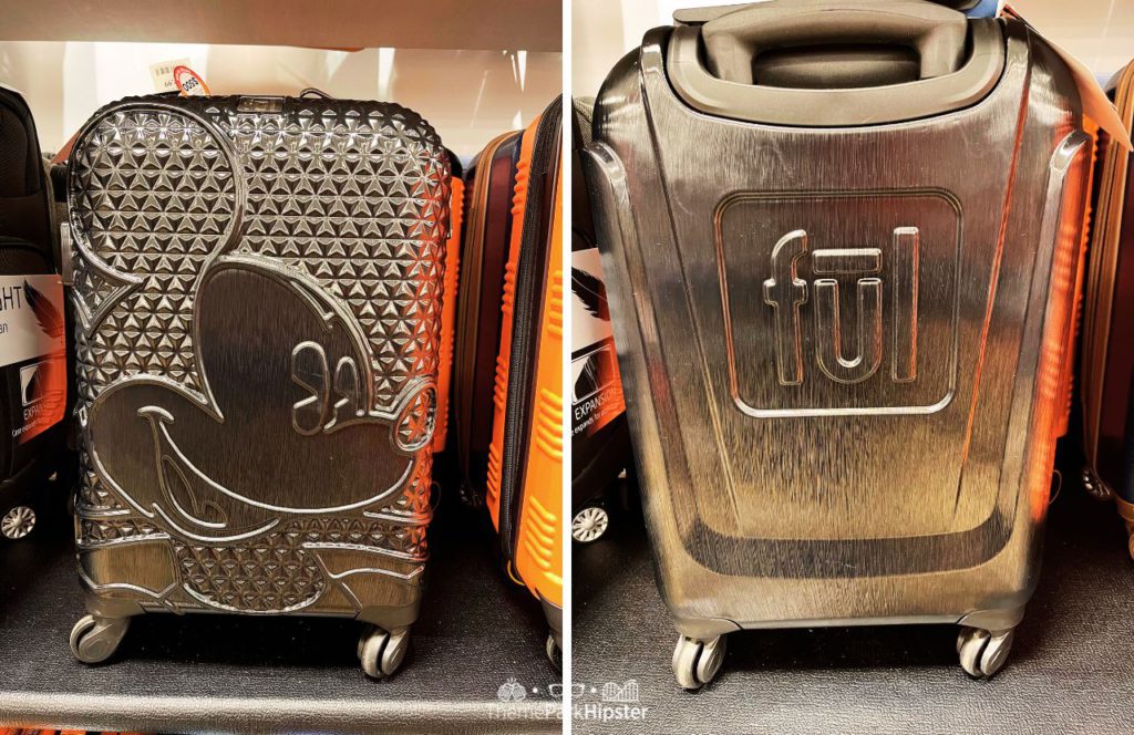 Silver Mickey Mouse Suitcase with Epcot inspired pattern. One of the best Disney gift ideas.