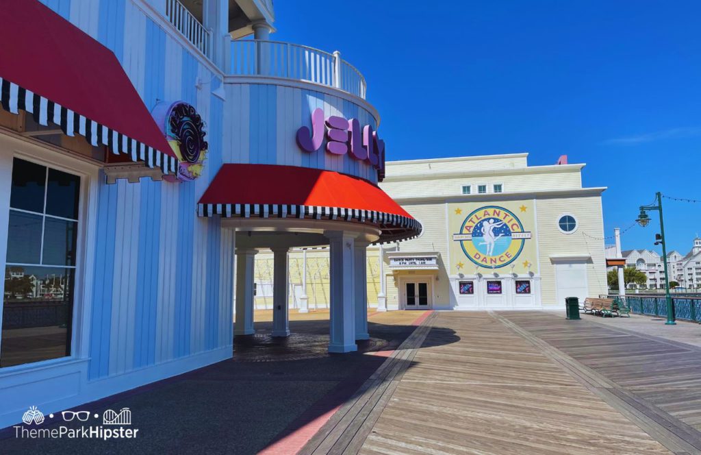 Walking to Jellyrolls and Atlantic Dancehall at Disney BoardWalk Hotel. Keep reading to know how to choose the best Disney Deluxe Resorts for your vacation.