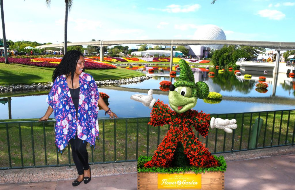 NikkyJ Going to Epcot Flower and Garden Festival Alone. Keep reading to learn the difference between alone vs lonely and how to have the perfect solo Disney World trip.