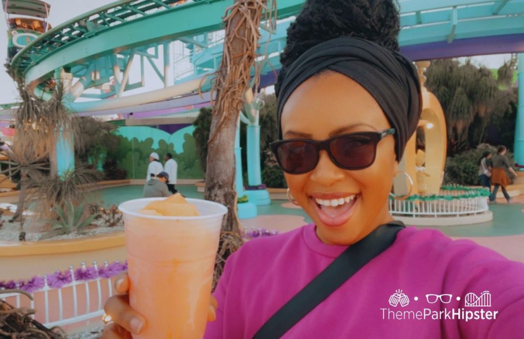 Nikky J at Universal Orlando Resort with her sunglasses on. Keep reading to discover what to pack for Universal Studios Florida.