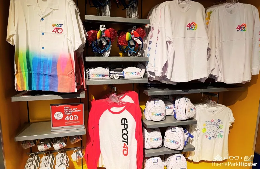 Epcot 40th Anniversary Shirts Minnie Ears Lounge Fly Bag Cups and Figment Shirt at Walt Disney World Resort. Keep reading to know what to pack and what to wear to Disney World in July for your packing list.