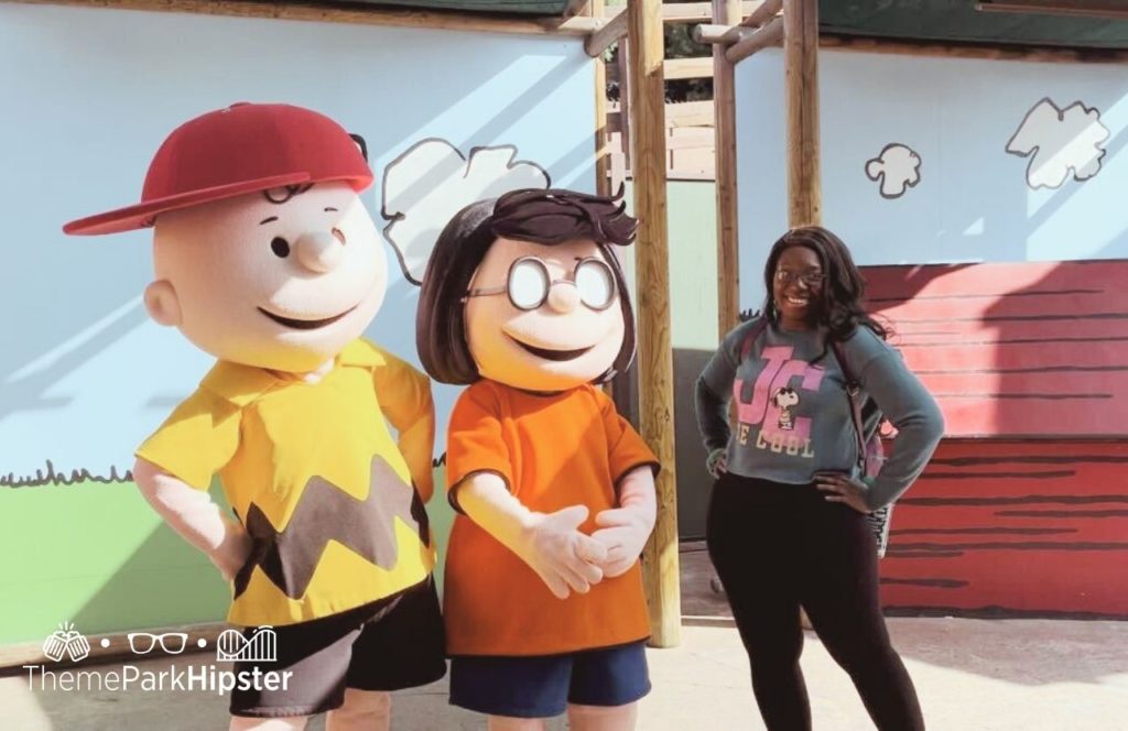 2024 Knott's Berry Farm Peanuts Celebration in California Charlie Brown and Lucy van Pelt Characters with Victoria Wade
