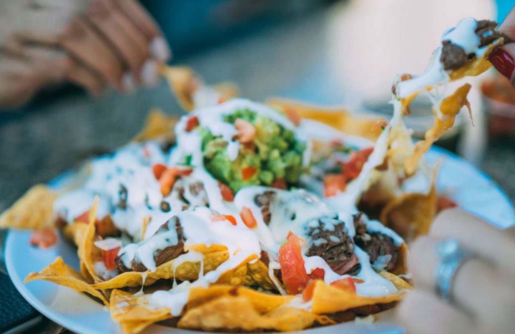 2024 Loaded Nachos at Knott's Berry Farm in Casa California Restaurante! Keep reading to get the best food at Knott's Berry Farm and the best things to eat.