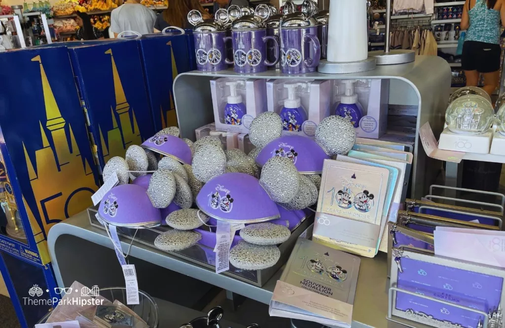 Epcot Flower and Garden Festival 2023 Disney 100th Anniversary merchandise with Mickey Ears and Cups. Keep reading to know what to pack and what to wear to Disney World in June for your packing list.