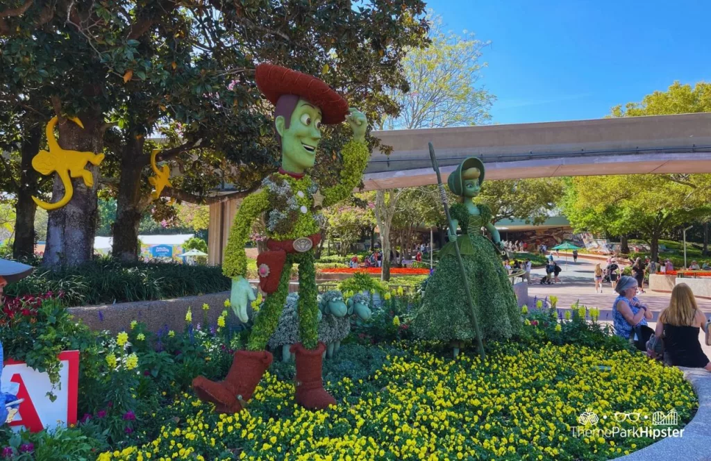 Epcot Flower and Garden Festival 2023 Woody and Bo Peep from the Toy Story Topiary one of the best things to do at Disney World in the Summer!