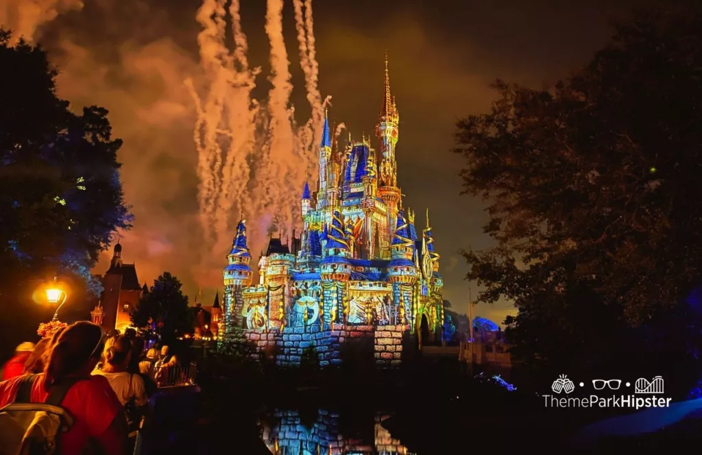 Mickey's Not So Scary Halloween Party at Disney's Magic Kingdom Theme Park Fireworks Show over Cinderella Castle. Keep reading to get the best hip packs and fanny packs for Disney World.