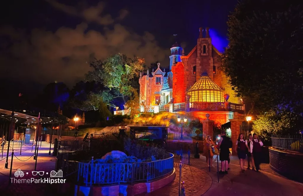 Mickey's Not So Scary Halloween Party at Disney's Magic Kingdom Theme Park Haunted Mansion View at Night one of the best things to do at Disney World in the Summer!