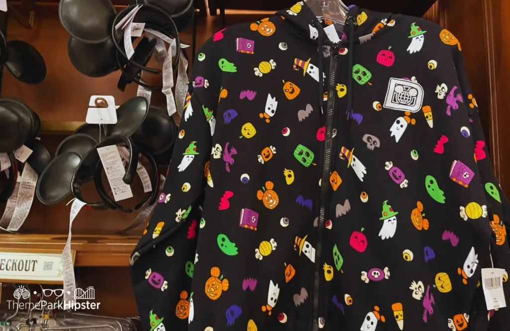 Mickey's Not So Scary Halloween Party at Disney's Magic Kingdom Theme Park Merchandise Black Mickey Mouse Ears and Black Sweater Jacket. Keep reading to know what to pack and what to wear to Disney World in August for your packing list.