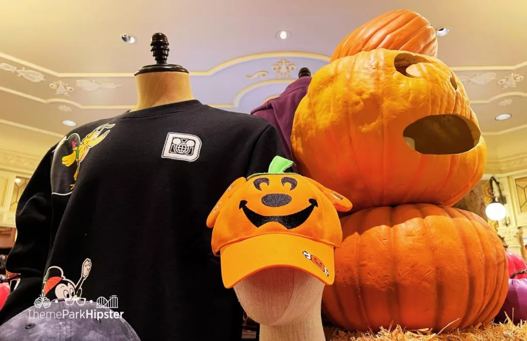 Mickey's Not So Scary Halloween Party at Disney's Magic Kingdom Theme Park Merchandise Spirit Jersey Shirt and Pumpkin Hat. Keep reading to know what to pack and what to wear to Disney World in September on your packing list.