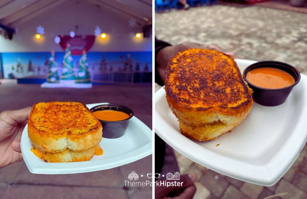 SeaWorld Orlando Christmas Celebration Grilled Cheese Sandwich with tomato dipping soup. Keep reading if you want to learn more about the best food at SeaWorld Orlando Christmas Celebration.