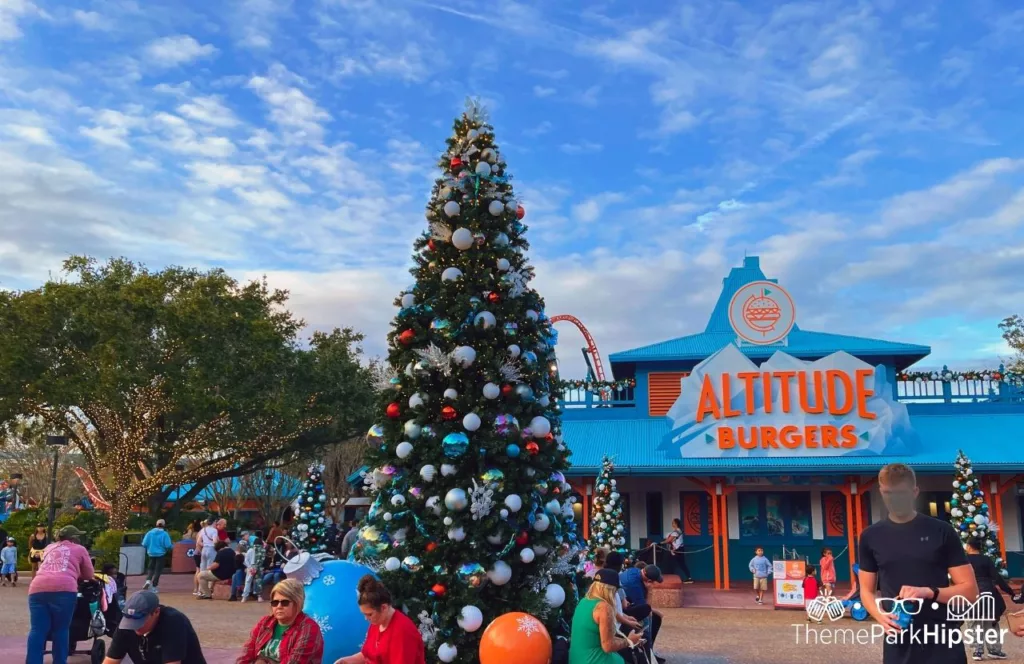 2023 SeaWorld Orlando Resort Christmas Celebration Holiday Tree in front of Altitude Burgers