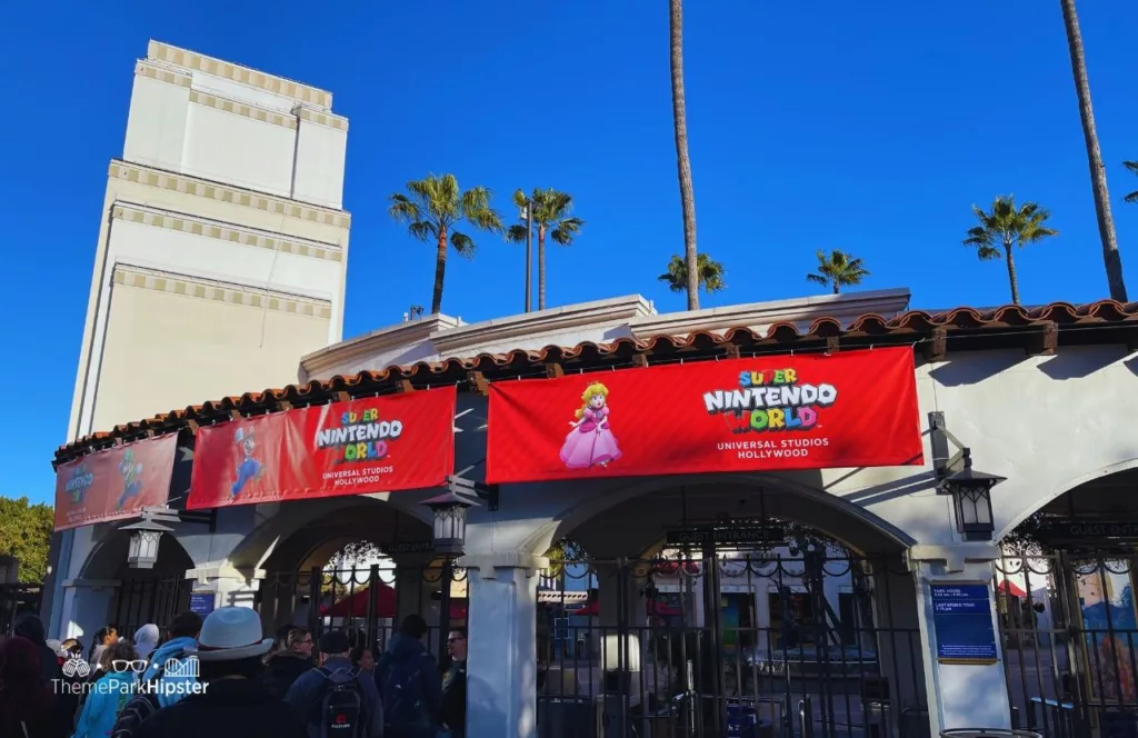 Universal Studios Hollywood Gate Entrance with Super Nintendo World Sign. Keep reading to get the full Guide to Parking at Universal Studios Hollywood with FREE Options and Prices.