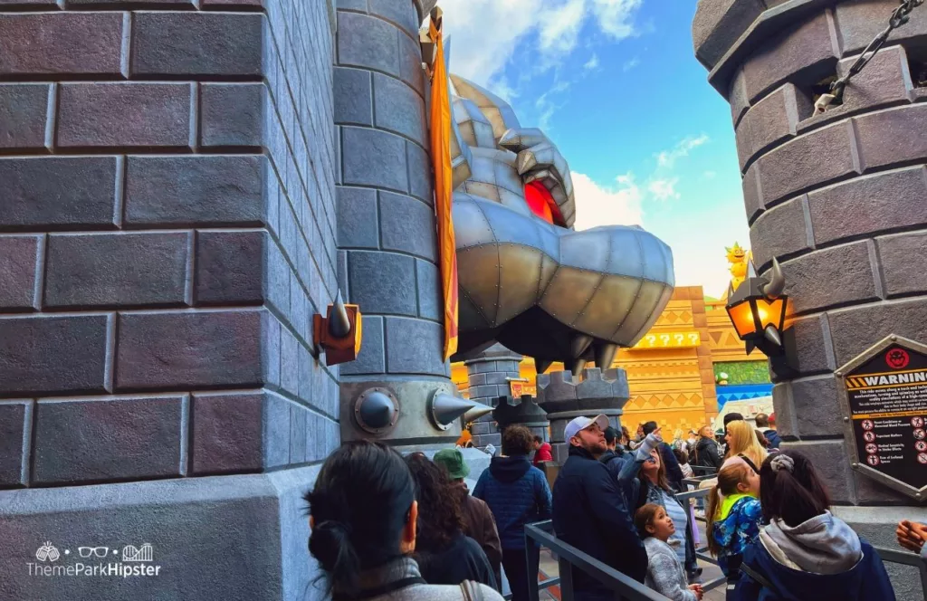 Universal Studios Hollywood Super Nintendo World Mario Kart ride entrance at Bowser’s Castle. Keep reading to get all the 2024 Universal Studios Hollywood Height Requirements and Restrictions for your trip.