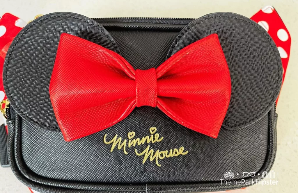 Winghouse x Minnie Red Ribbon Polka Dot waist pack. One of the Best Disney World Fanny Packs 