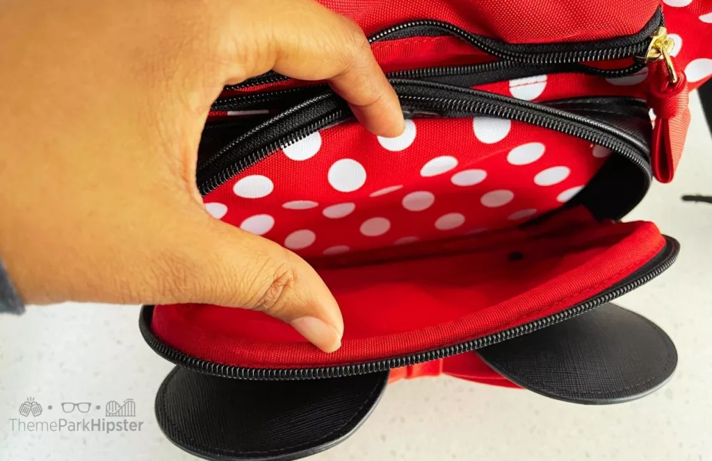 Winghouse x Minnie Red Ribbon Polka Dot waist pack. One of the Best Disney World Fanny Packs