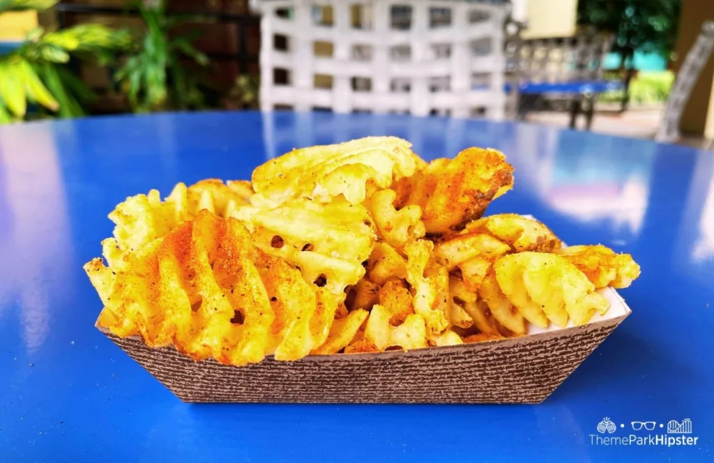 Seasoned fries from  Zagora Cafe food at Busch Gardens Tampa Bay  during Christmas Town. Keep reading to find out more about what to eat at Busch Gardens Tampa.